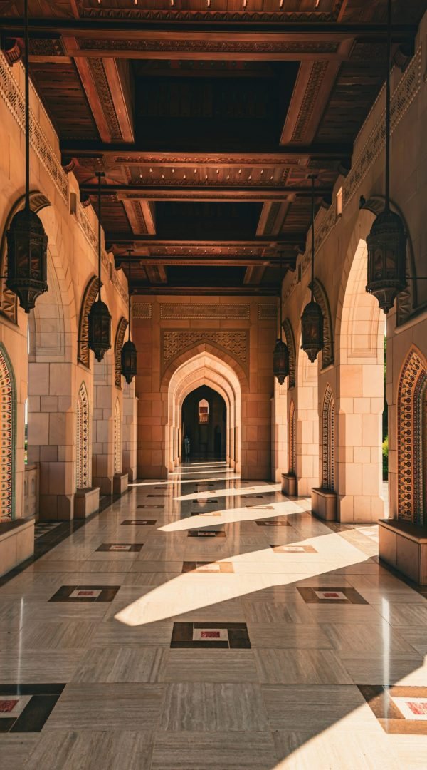 pexels-photo-18869705-18869705 Elegant architectural arches of Sultan Qaboos Grand Mosque in Muscat, Oman.